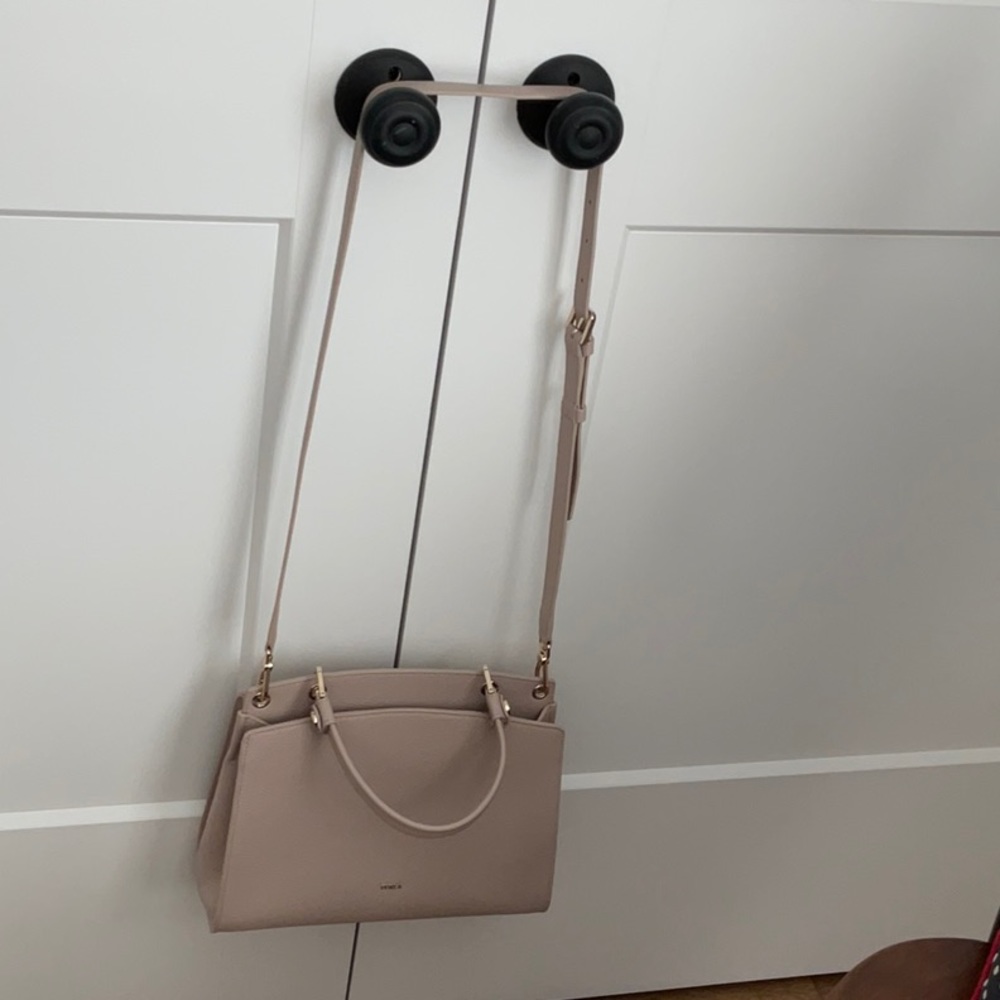 Furla New w/o tag.  Tan leather bag, shoulder strap/crossbody or hand held!